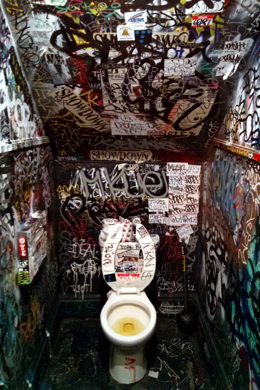 Graffiti in a bar bathroom