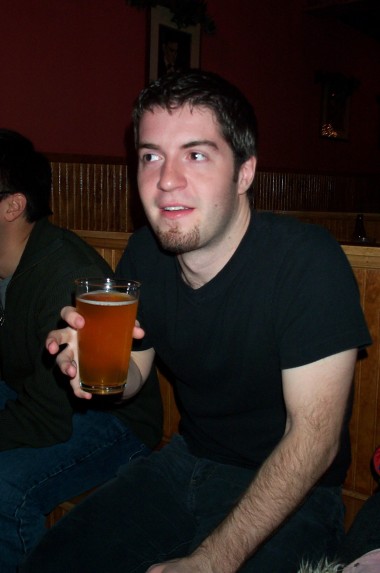Justin, newly 24, with a beer