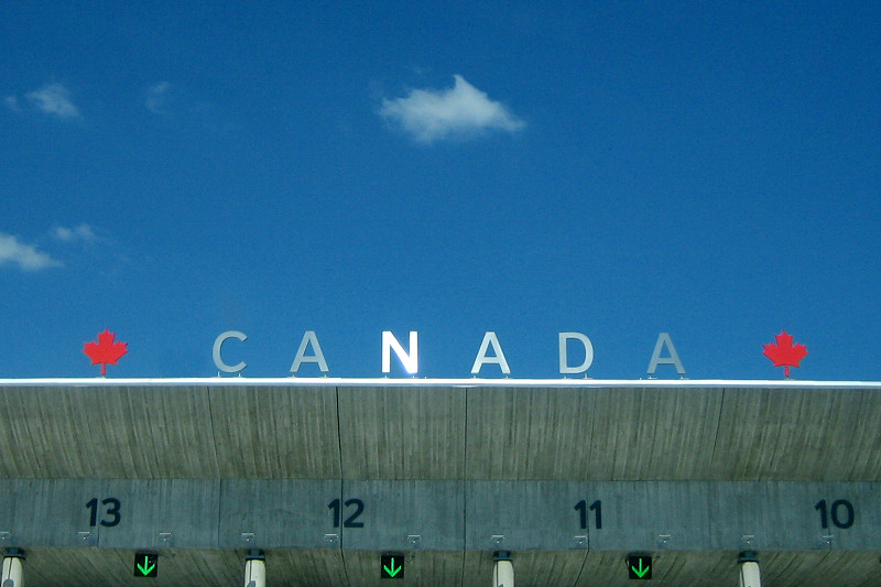 Canada sign on top of the customs plaza entering from the US