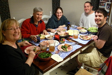 The whole family enjoying a Christmas Eve Raclette