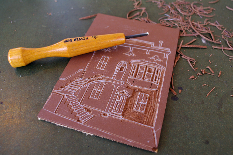 Carving linoleum for a linocut print