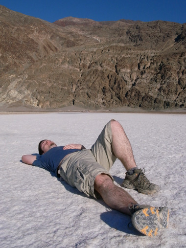 Justin laying down on the Badwater Basin