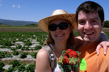 Stephanie and Justin showing off their strawberries