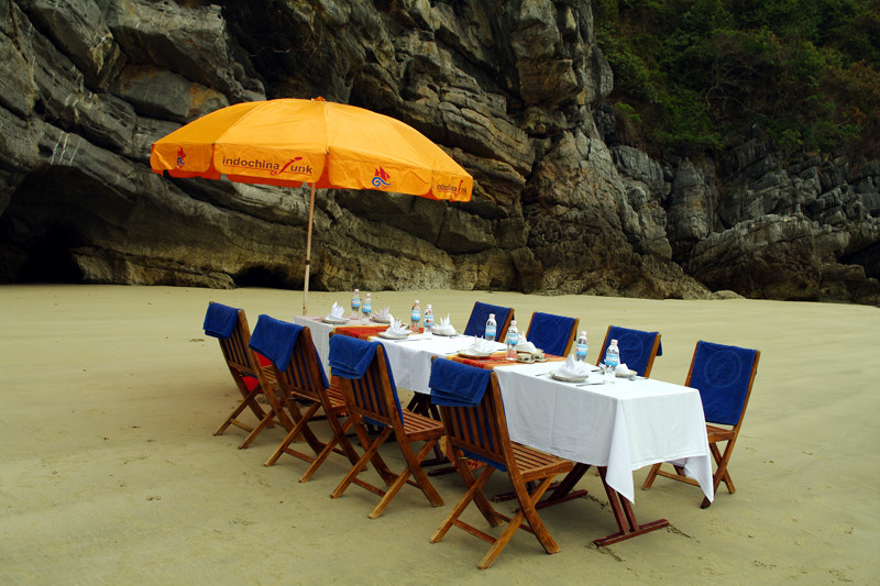 Table on beach for lunch barbecue in Hạ Long Bay, Vietnam