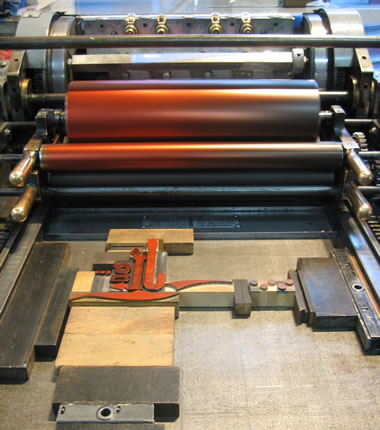 Getting ready to print the cover on a Vandercook 4