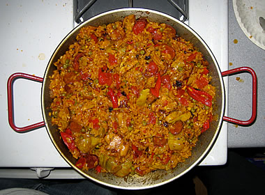 Paella cooking in a paella pan