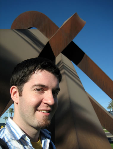 Justin in front of public art