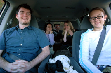Justin, Marcia, Kyle, Joy, and Stephanie inside the minivan
