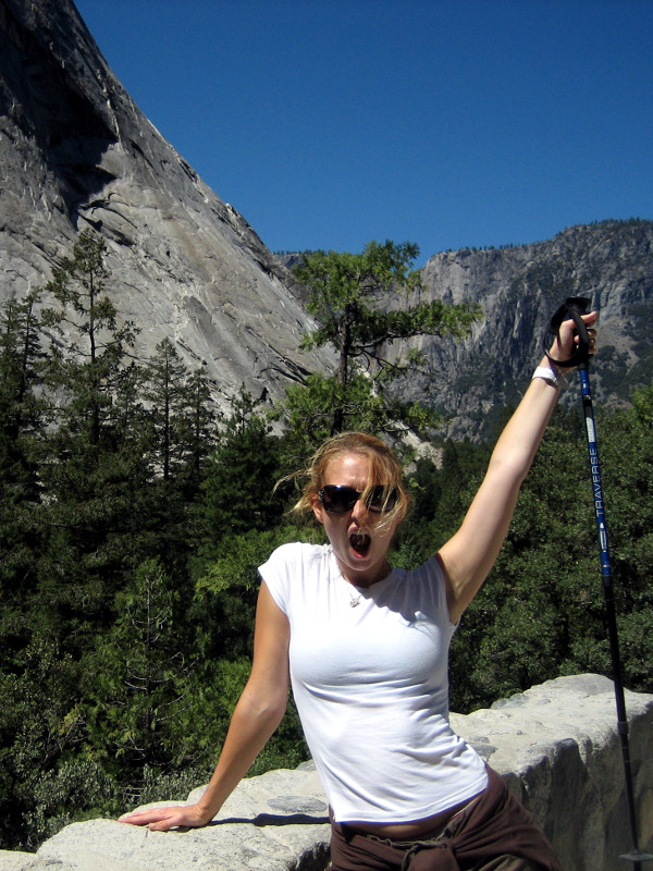 Stephanie celebrates taking a break on the Mist Trail in Yosemite National Park