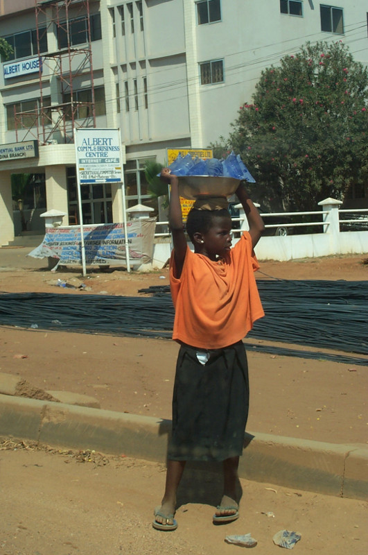accra ghana girl selling water bags