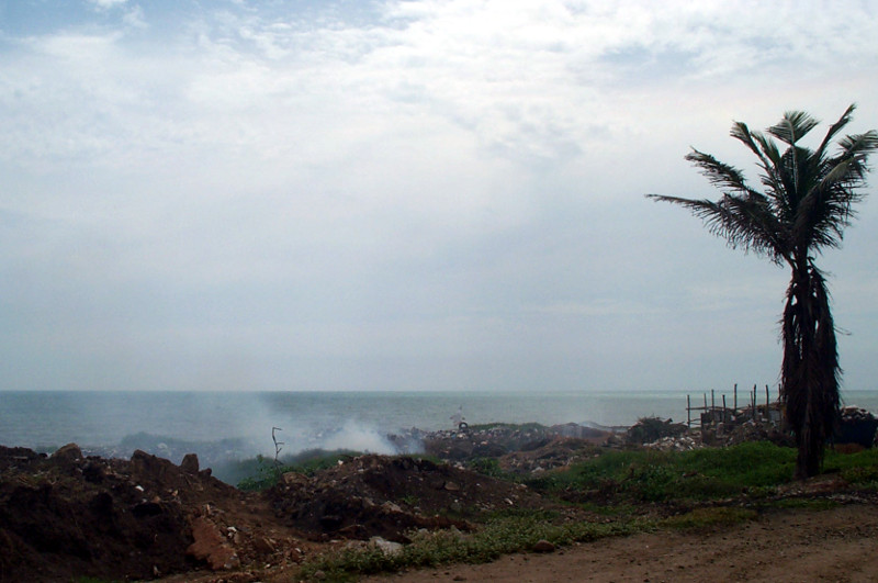 accra ghana trash burning along the coast