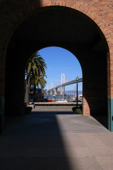 The Bay Bridge framed by an arch