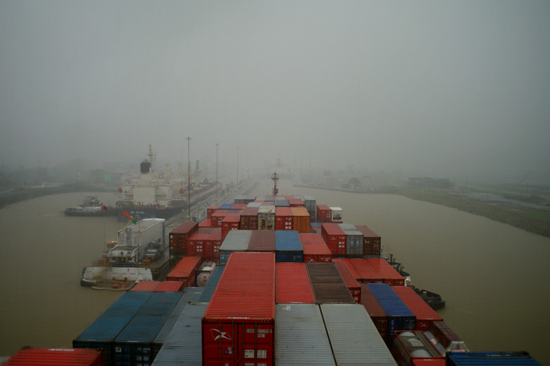 Approaching the Pedro Miguel Locks of the Panama Canal in the rain