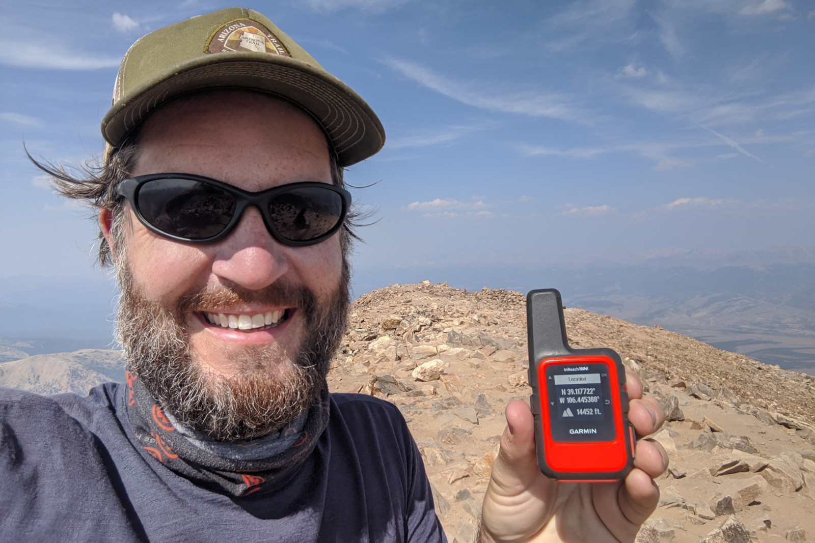 Justin at the summit of Mount Elbert with an inReach