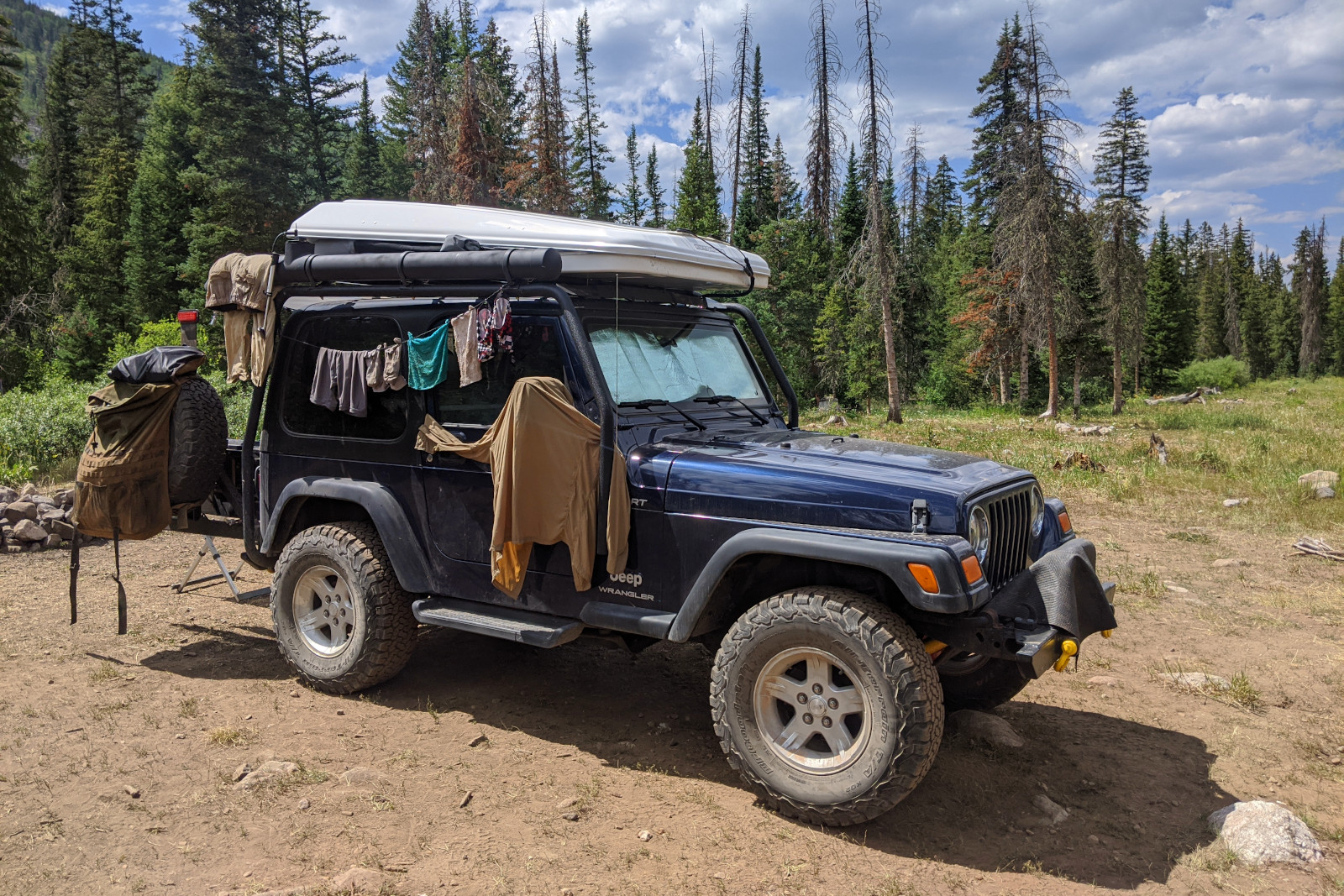 Wet clothes drying on a Jeep Wrangler