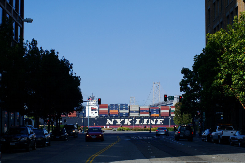 Container ship passing by Folsom and Embarcadero