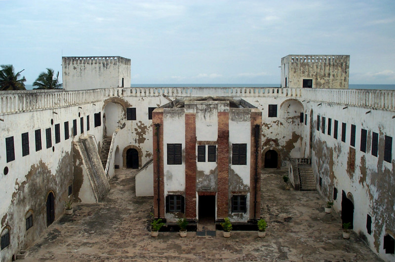 a catholic church stood in the middle of the fort, surrounded by slave dungeons