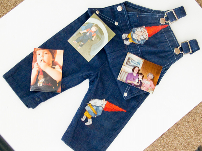 Embroidered gnome overalls with pictures of Justin wearing it