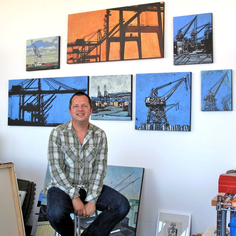 Eric Rewitzer with his Port Authority container crane paintings