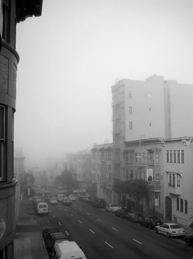 the fog, looking down pine street