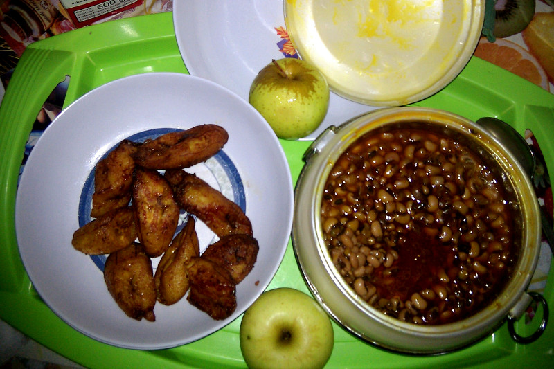 Fried red plantains and beans in Ghana