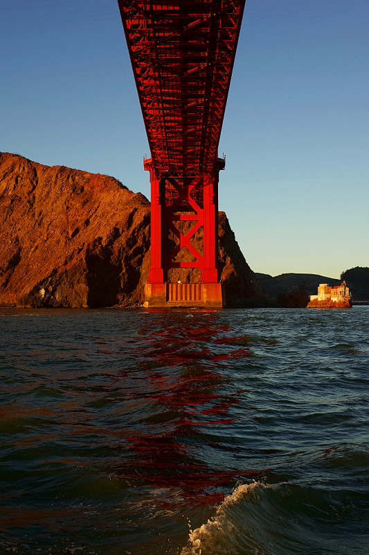 Golden Gate Bridge and Lime Point Lighthouse at sunset
