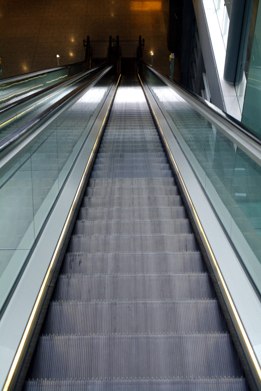 Looking down the longest escalator in Heathrow