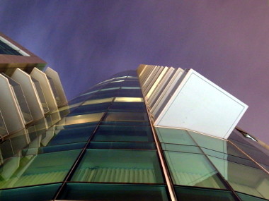 Looking up at the Infinity Tower at night