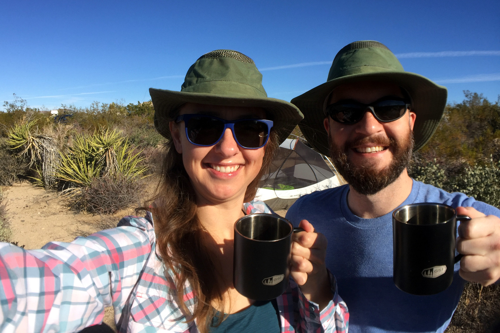 Justin and Stephanie with coffee mugs at Cottonwood Campground in Joshua Tree National Park