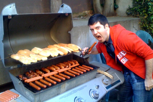 Justin grilling hot dogs in Sausalito
