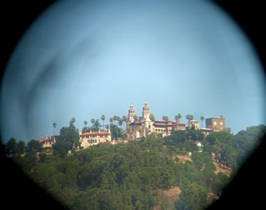 Hearst Castle as seen through a viewing telescope