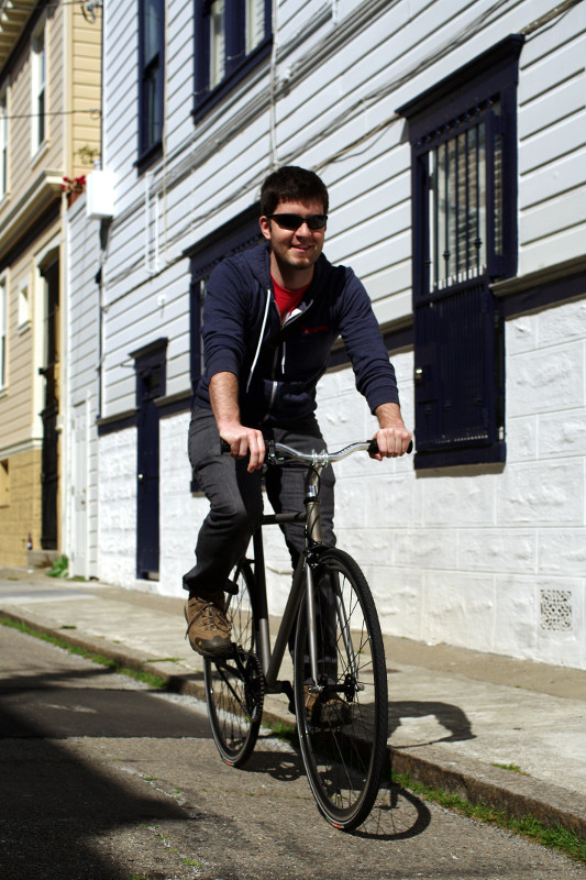 Justin riding his new bike from Mission Bicycles