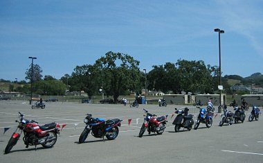 Motorcycles and scooters all lined up