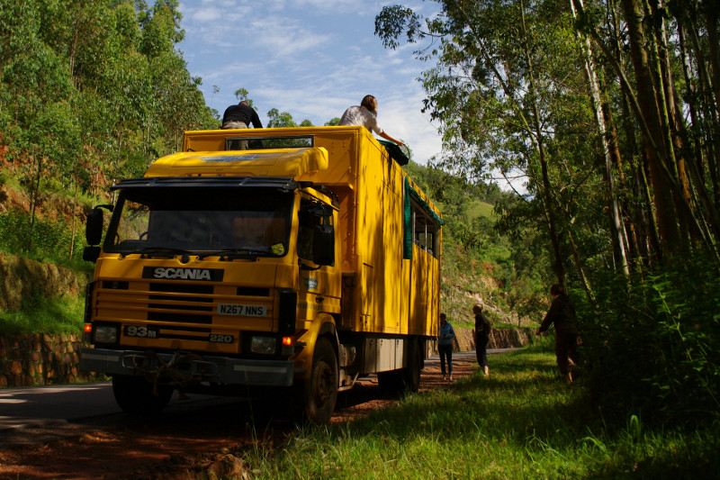 Opening the beach on our Oasis Overland truck after a bush pee stop in Rwanda
