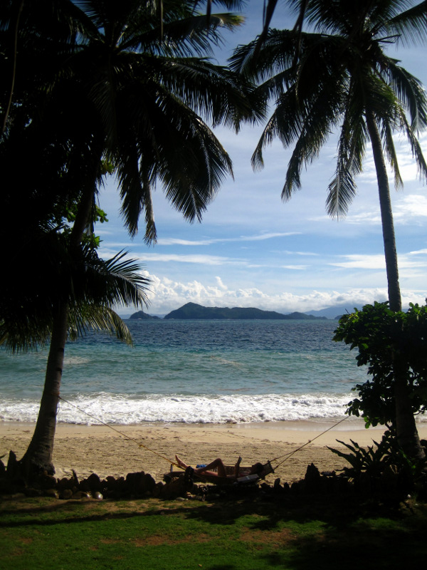 palawan coconut garden island resort hammock between coconut trees