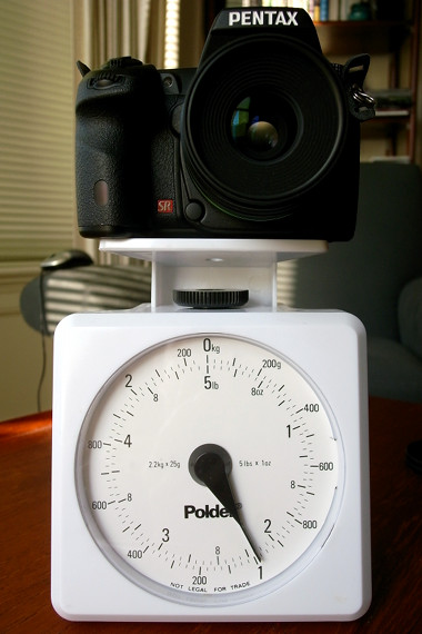 Pentax K-7 with the DA 35mm Macro Limited lens on a kitchen scale