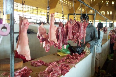 butcher at the central market. note: the air was not conditioned