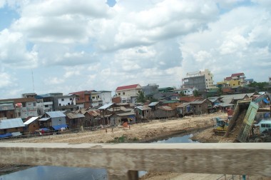 not the best photo, but another view of phnom penh - shanties by the side of a gully
