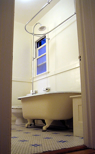 Pine Street apartment bathroom with clawfoot tub