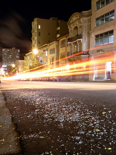 Broken glass on Pine Street at night