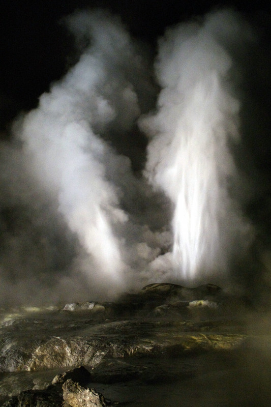 Pohutu Geyser erupting at night