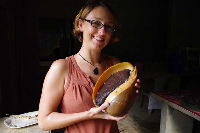 Stephanie shows off the giant conch-like berican shellfish