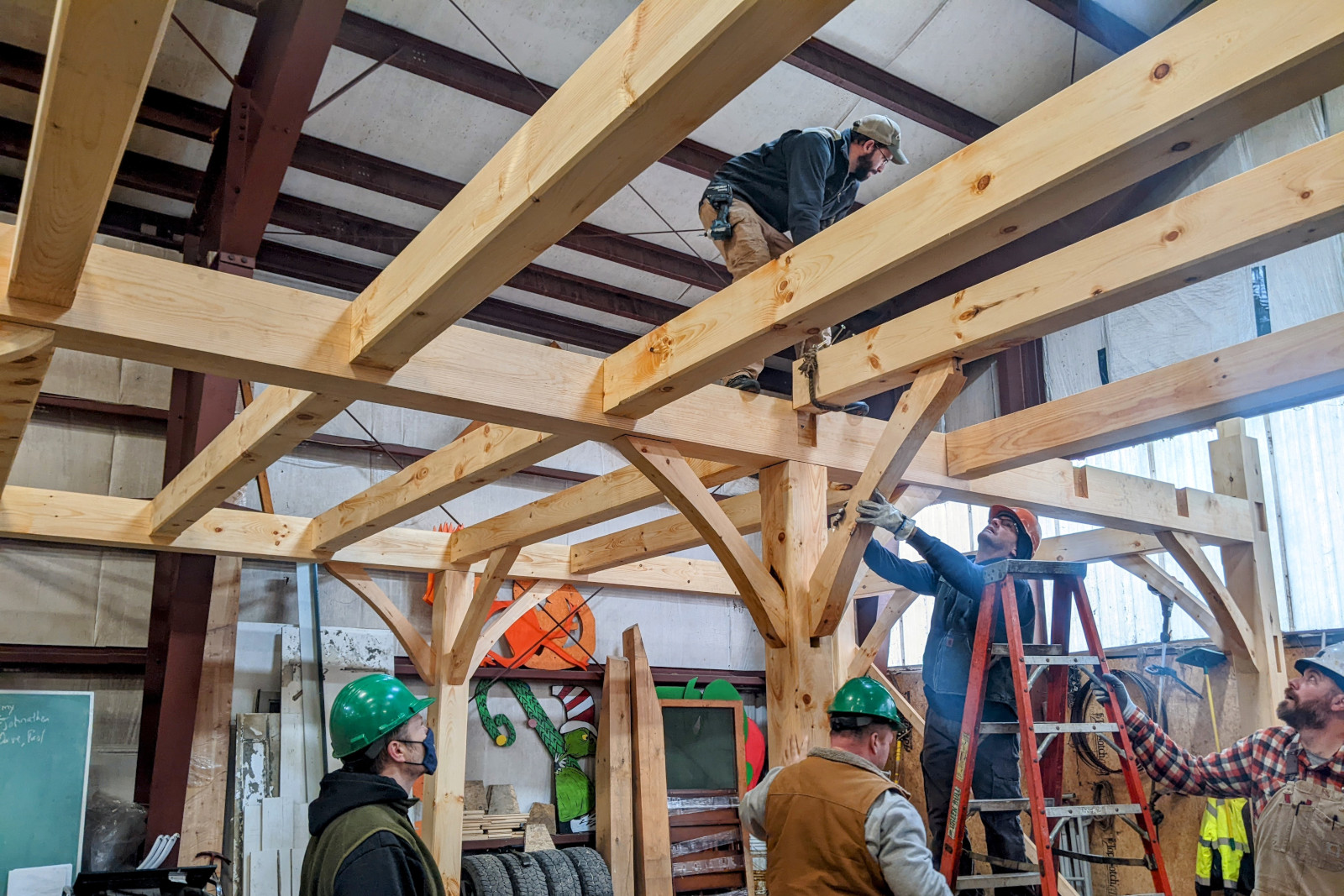 Installing the joists on day 5 of Shelter Institute's Purely Post & Beam class