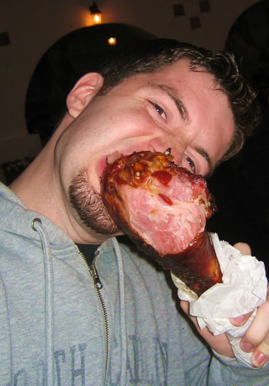 Easting a smoked turkey leg at the Sonoma County Fair
