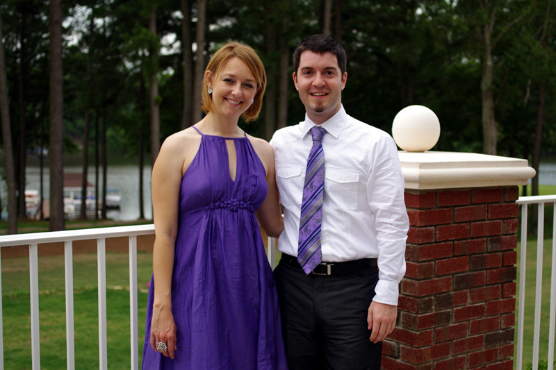 Stephanie in a purple dress, and Justin with a purple tie, at Patrick and Laura's wedding