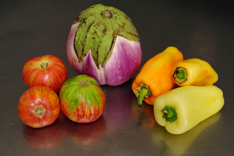 Heirloom tomatoes, rosa bianca eggplant (aubergine), and sweet peppers