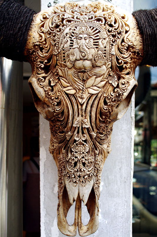Detail of a carved water buffalo, portraying the Hindu deity Ganesha, found in Ubud, Bali, Indonesia