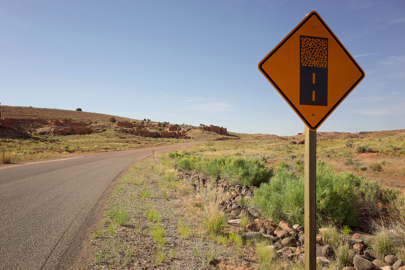 'Pavement ends, dirt road begins' sign along Notom-Bullfrog Road in Capitol Reef National Park