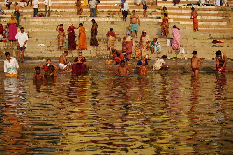People on the ghats along the Ganges in Varanasi, India