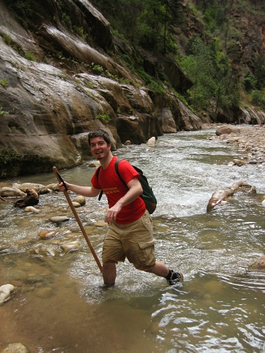 Justin crosses the Virgin River for higher ground in Zion National Park